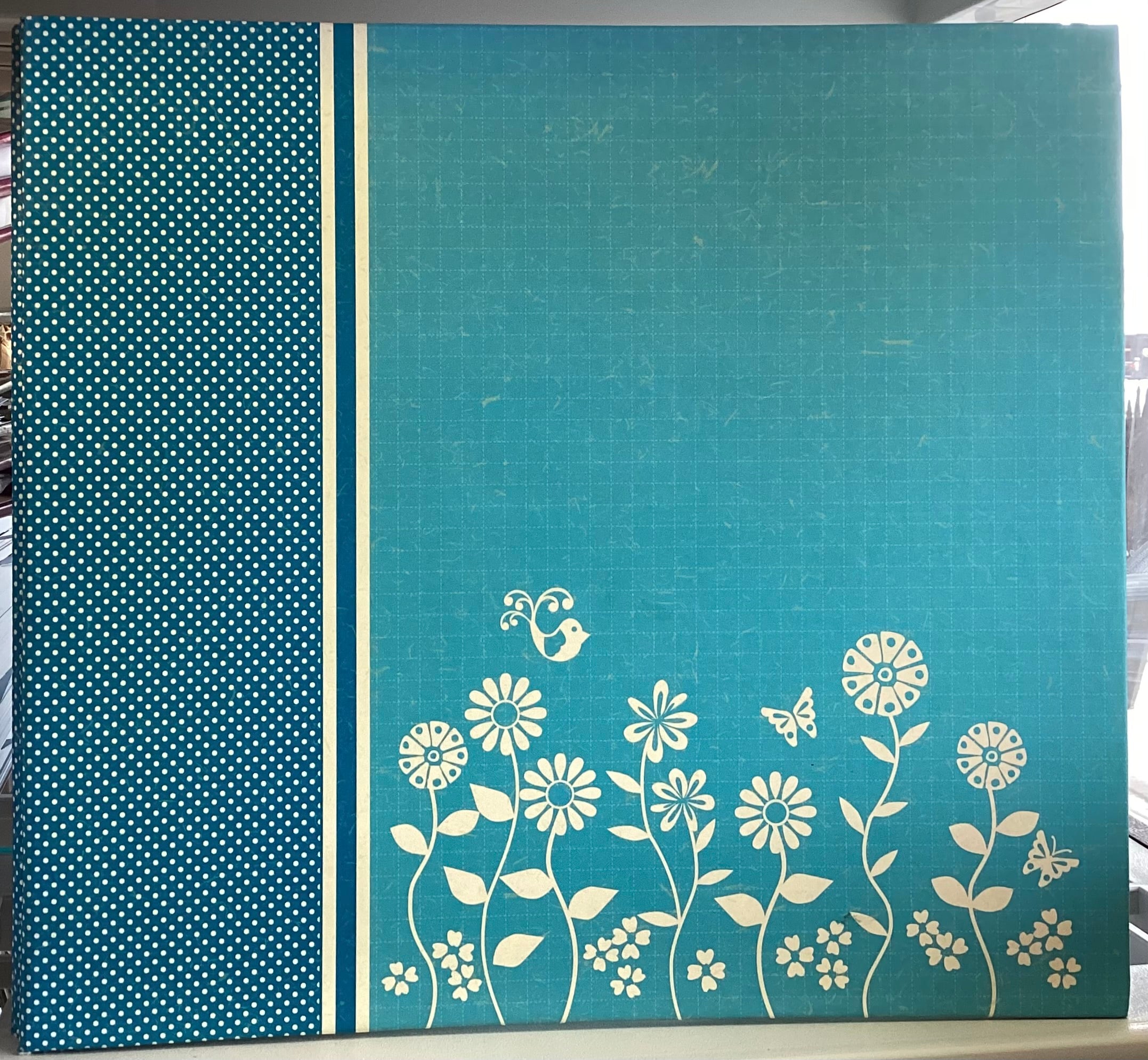 34B8EB36-8B69-4F9B-969C-4D4ED85AA085 Colorbok DISTRESSED BLUE FLORAL 12”x12” Postbound Scrapbook Album - Image 1