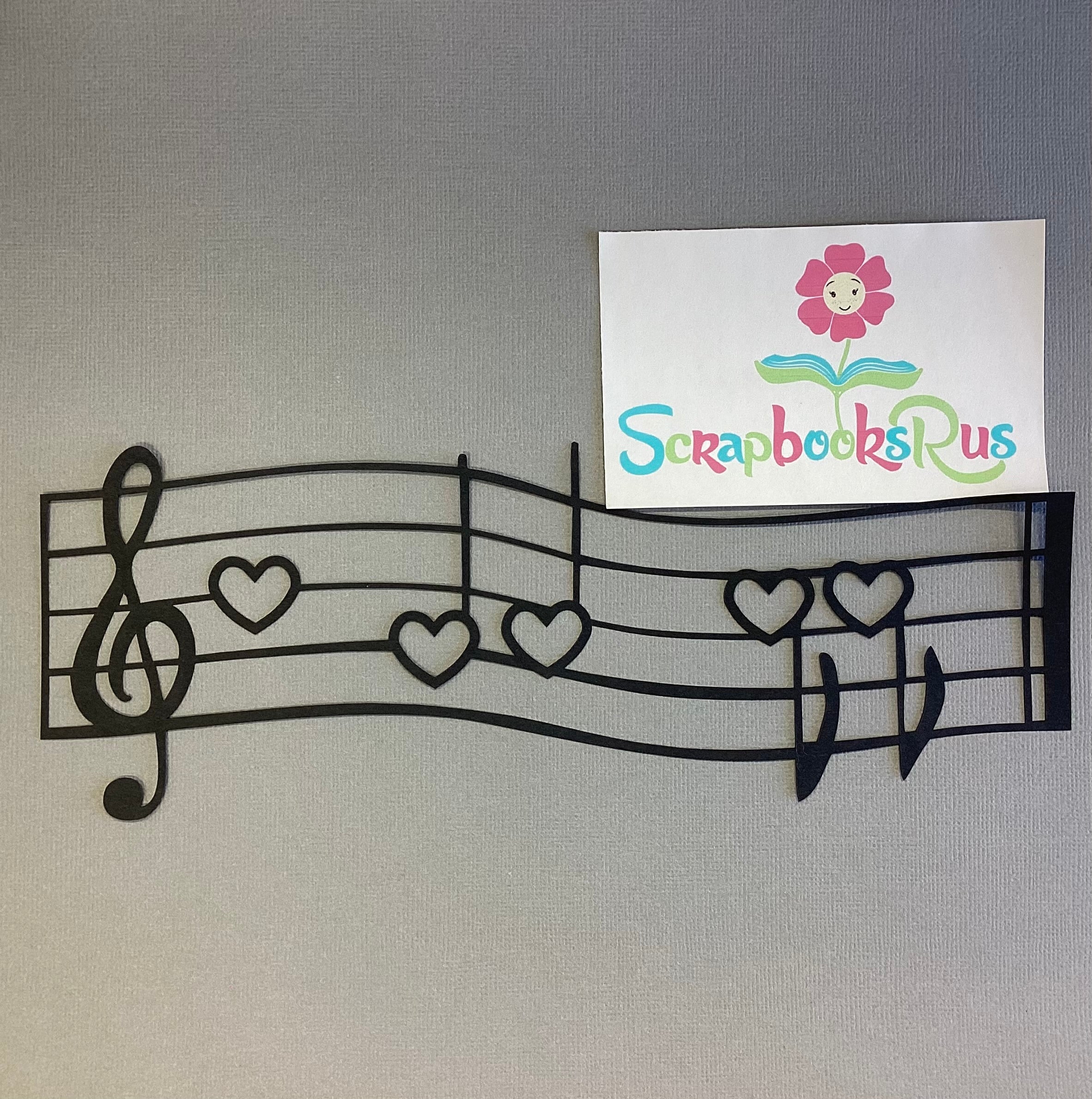 C8F140A9-6C32-42D6-8FDF-E2740B253BE5 Laser Cuts MUSIC HEARTS CURVED Black Diecut Border - Image 1