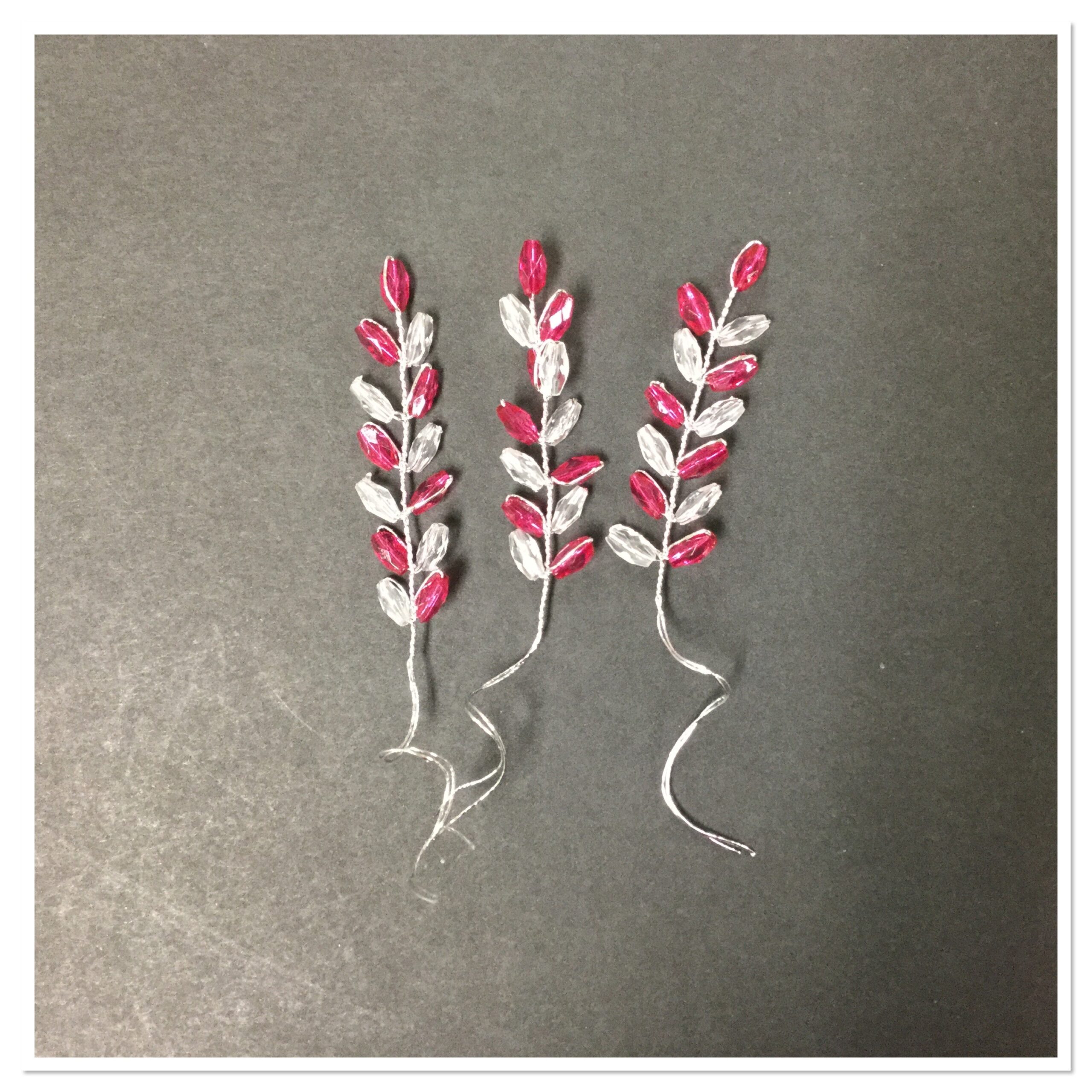 07CCFE23-7A17-44CB-B121-3A5E42672F6C.jpg Pink & Clear Leaf 1.5” Embellishment - Image 1