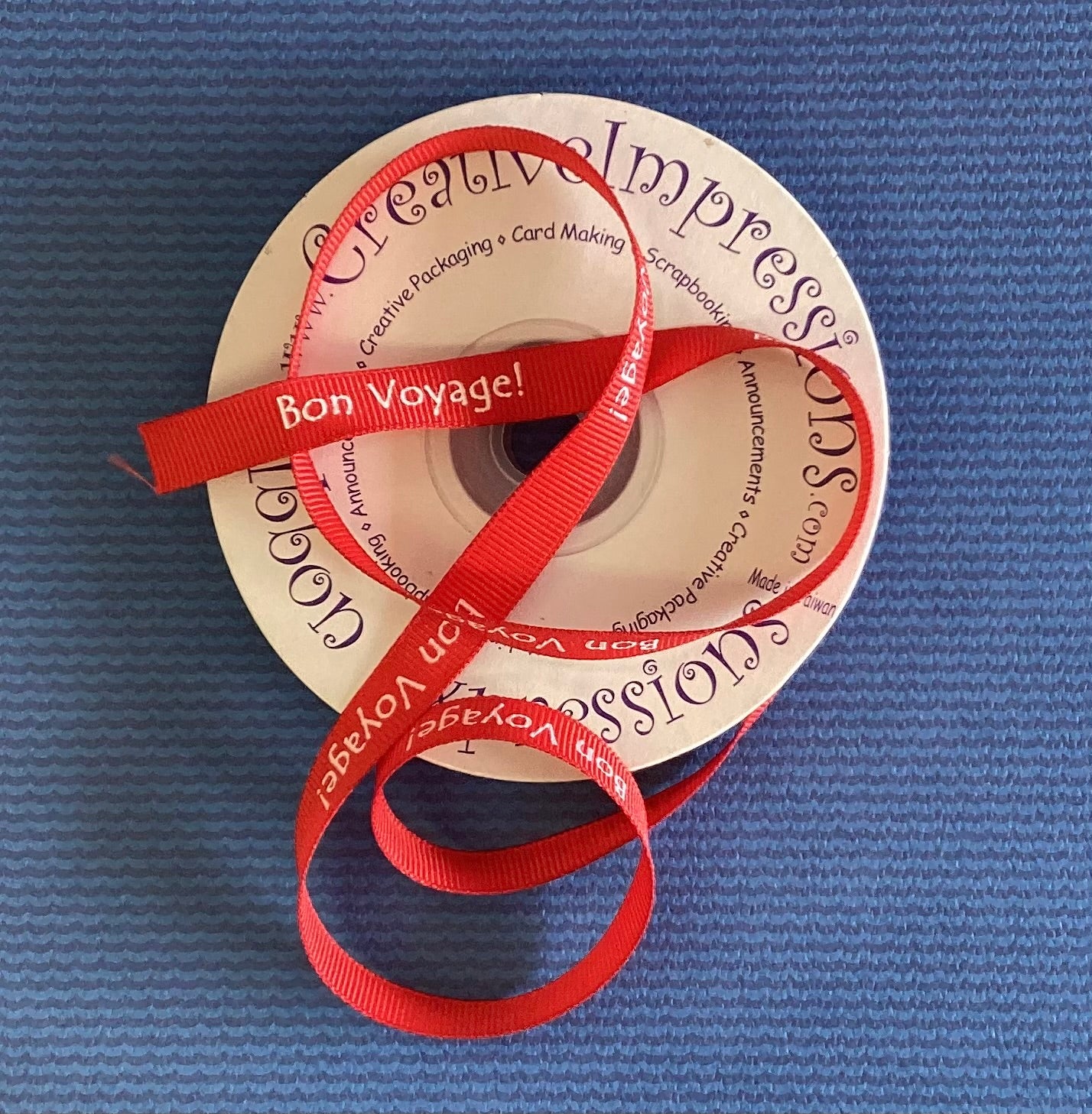 2D4D406F-C757-4FDB-A38D-4769429B2CF3.jpg Creative Impressions BON VOYAGE! Red Ribbon 1 yard - Image 1