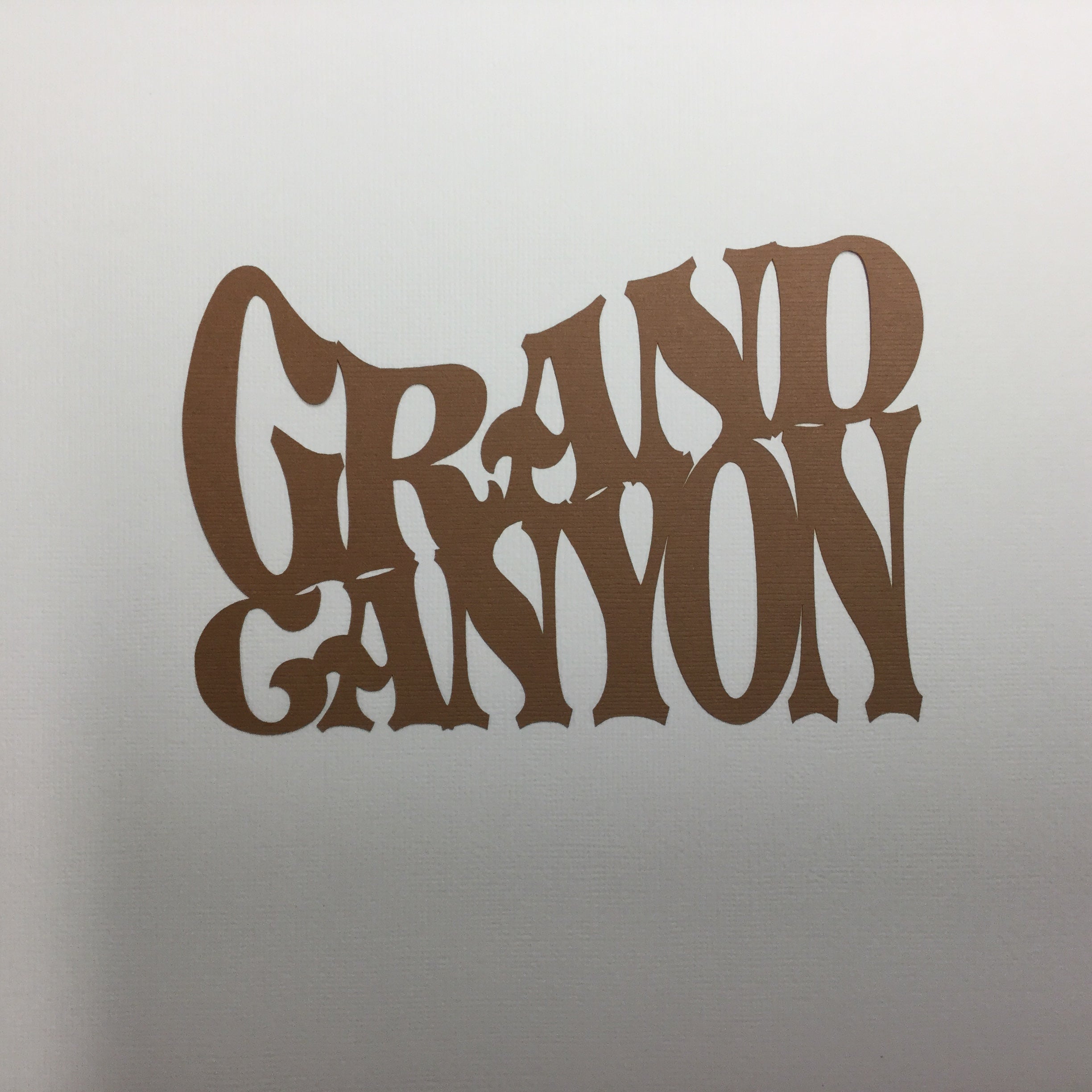 6ABF8A00-FC62-4F7A-88B7-B9B54116907D.jpg GRAND CANYON Rust Travel Laser Cut Diecut - Image 1