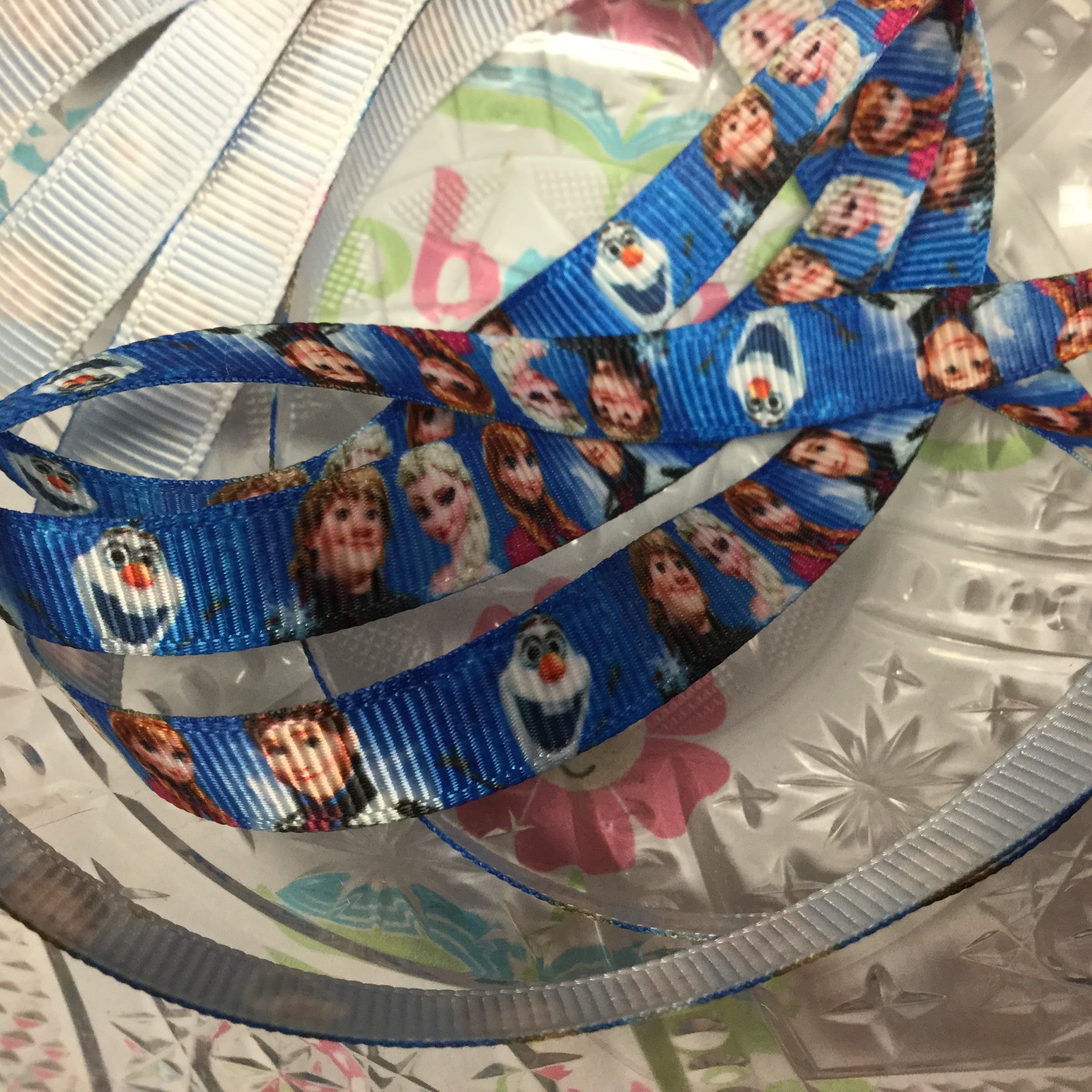 image_46ce85e5-2f57-4478-a205-26e4b1dc258a.jpg Disney FROZEN Movie Character Ribbon 3/8” - Image 1