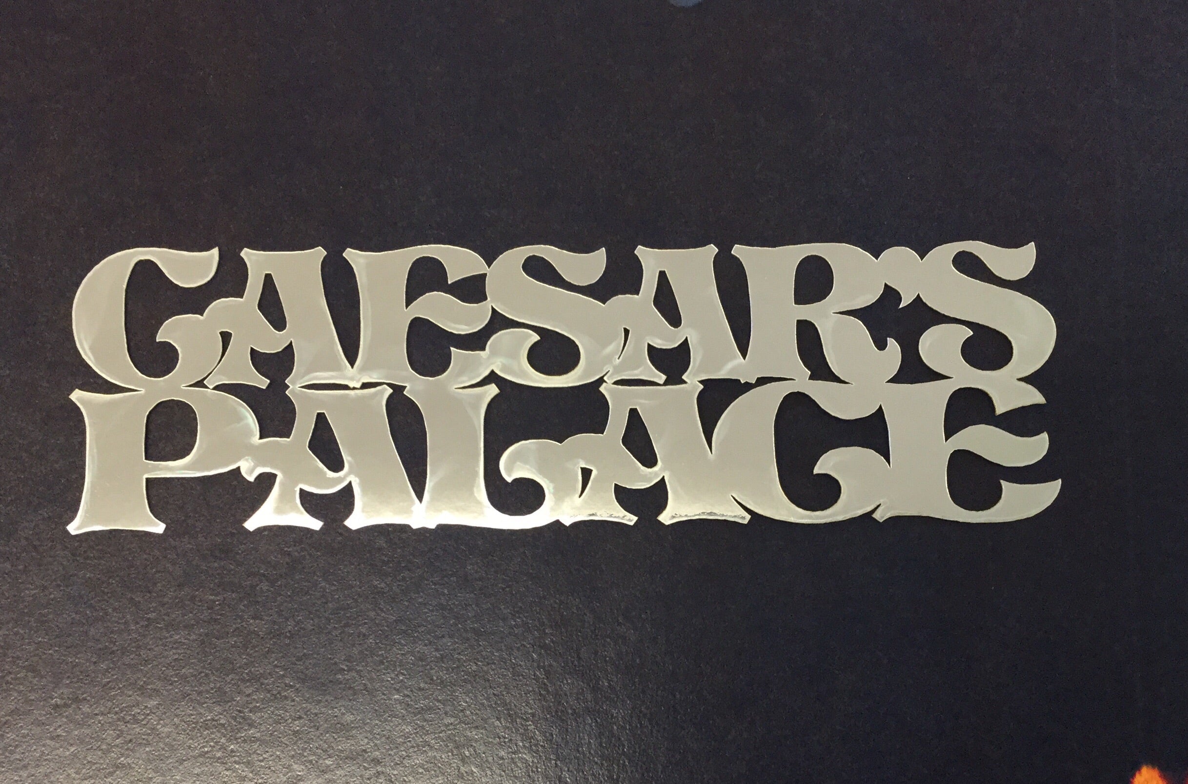 image_9b829a19-262e-4283-a361-b7bbd30a176a.jpg CAESARS PALACE Silver Title Travel Laser Cuts 3"X9" 1pc - Image 1