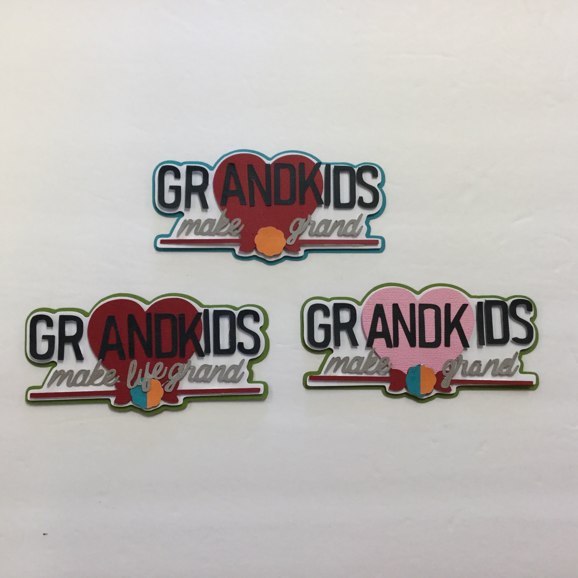 image_c76d154f-7f28-4cba-9cc1-9fc68b5cc4c9.jpg GRANDKIDS MAKE LIFE GRAND Scrapbook Die Cut Embellishment - Image 1